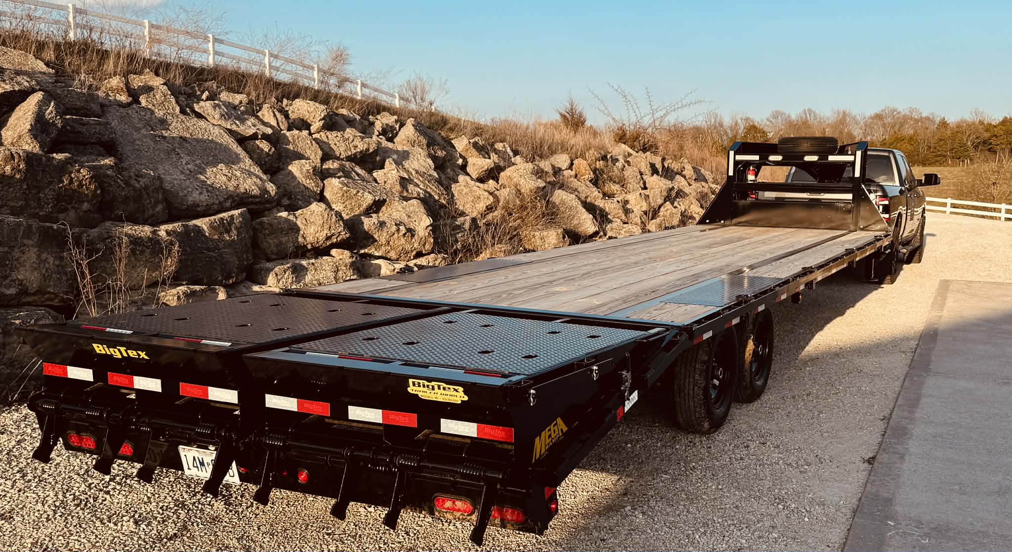 JDB Express Transport - BigTex 30ft flatbed trailer with mega ramps rear view